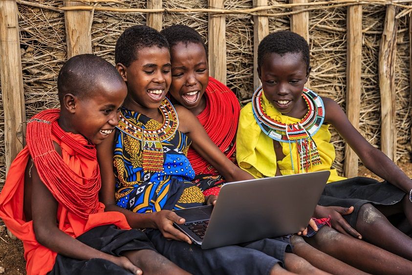 african children using laptop
