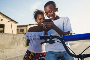 kids in remote location on cellphone from cell backhaul