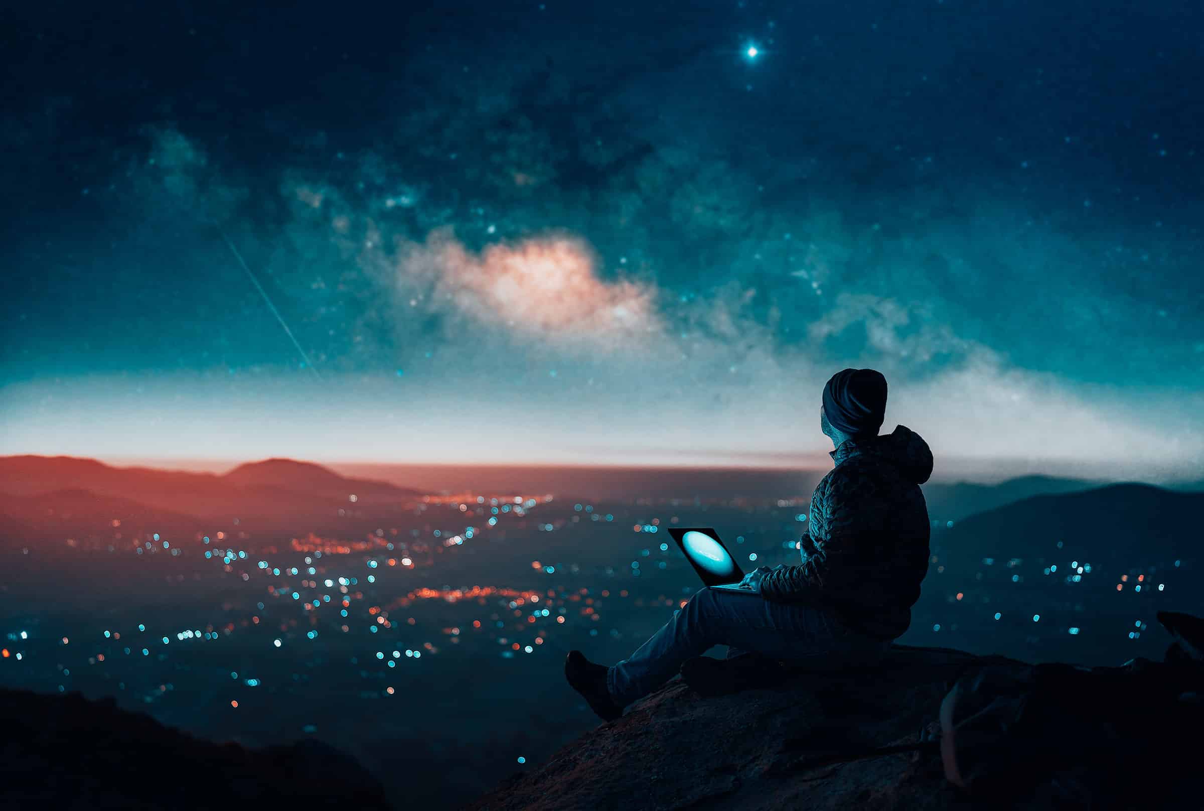 Man Stargazing Using Computer